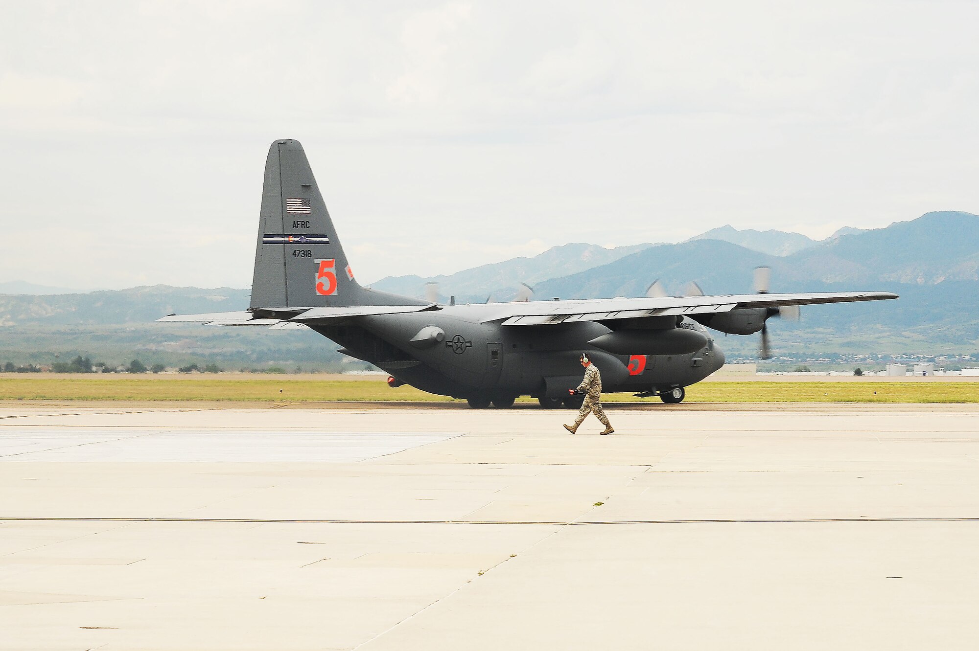 Modular Airborne Fire Fighting System-equipped C-130s from the Air Force Reserve Command's 302nd Airlift Wing depart Peterson AFB, Colorado, Aug., 3, 2015 in response to the initial National Interagency Fire Center MAFFS request for assistance. As of  Aug., 12, 2015, the two 302nd AW MAFFS-equipped C-130s and crews have made 91 retardant drops discharging 219,705 gallons of retardant to aid in the suppression of wildland fires in California. (U.S. Air Force photo/Senior Airman Amber Sorsek)