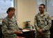 Chief Master Sgt. Tracey House, 28th Medical Group superintendent, visits with Airman 1st Class Roderick Williams, 28th Medical Operations Squadron bioenvironmental technician, and other personnel in the 28th MDOS bioenvironmental shop at Ellsworth Air Force Base, S.D., July 9, 2015. As a chief master sergeant, House brings substantial operational and occupational experience while developing subordinates into future enlisted leaders. (U.S. Air Force photo by Senior Airman Anania Tekurio/Released) 