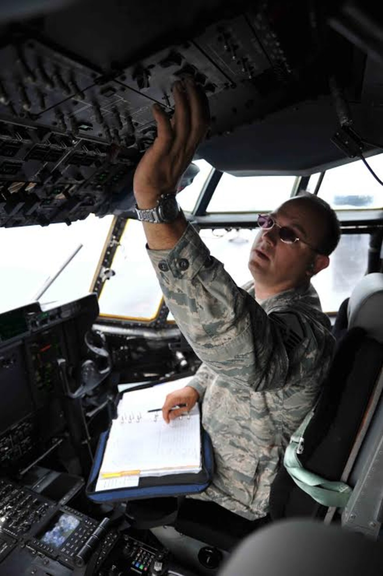 Master Sgt. David Workman, 403rd Aircraft Maintenance Squadron crewchief, runs his checklist on a WC-130J that returned from a weather reconnaissance mission into Tropical Storm Guillermo Aug. 5, 2015.The maintainers, along with the 53rd Weather Reconnaissance Squadron, assigned to the 403rd Wing at Keesler Air Force Base, Mississippi, deployed to Joint Base Pearl Harbor-Hickam, Hawaii to track Hurricanes Guillermo and Hilda. (U.S. Air Force photo/Maj. Marnee A.C. Losurdo)
