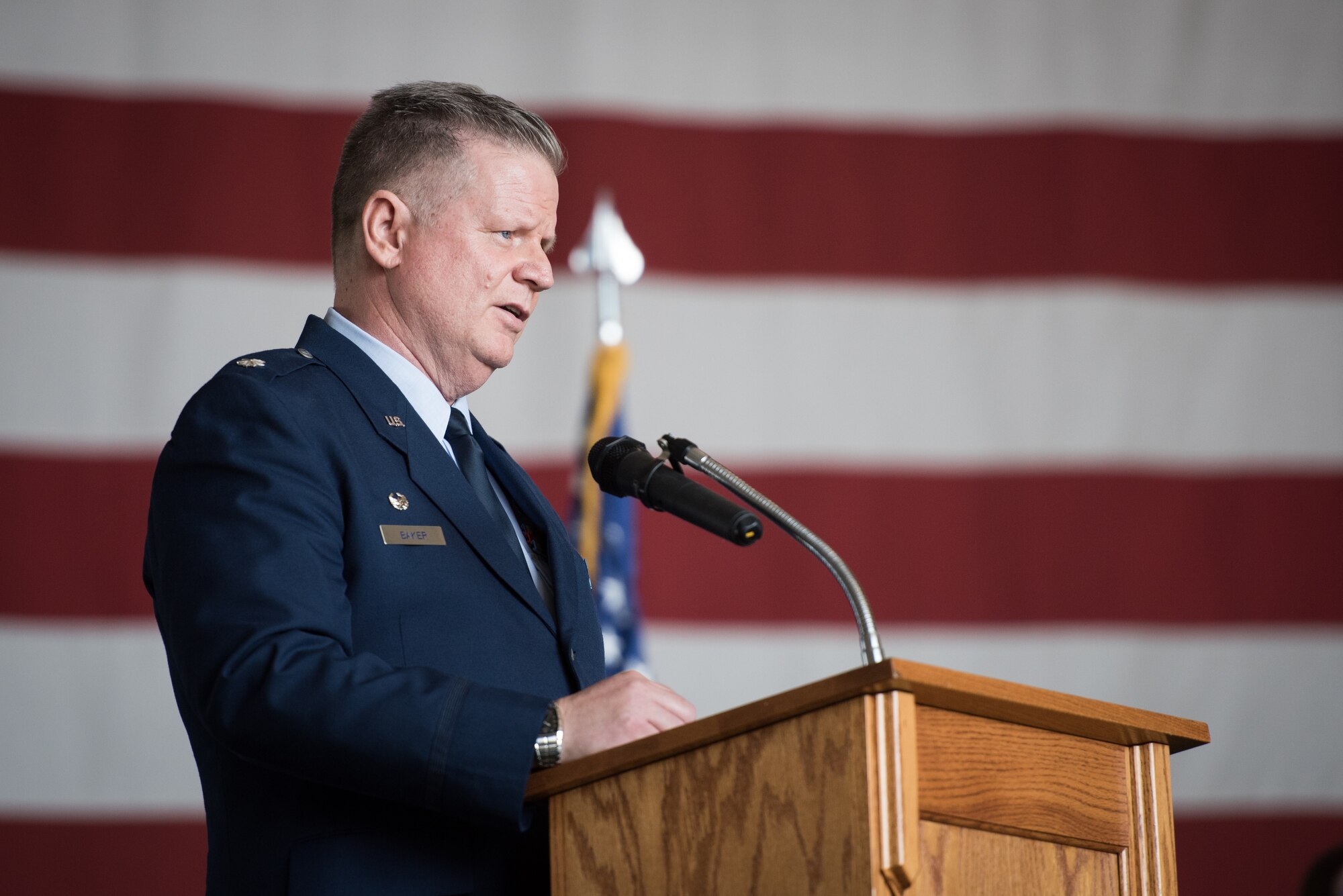 Lt. Col. Ralph Baker, 940th Aerospace Medicine Squadron commander thanks his family and friends for joining him at a ceremony where he assumed command of the squadron from Col. John Trnka, Jr., 940th Wing commander Aug. 2, 2015 at Dock 6, Beale Air Force Base, Calif. Trnka also shared his appreciation for the numerous attendees witnessing the military tradition.  (U.S. Air Force photo by Staff Sgt. Brenda Davis/Released)