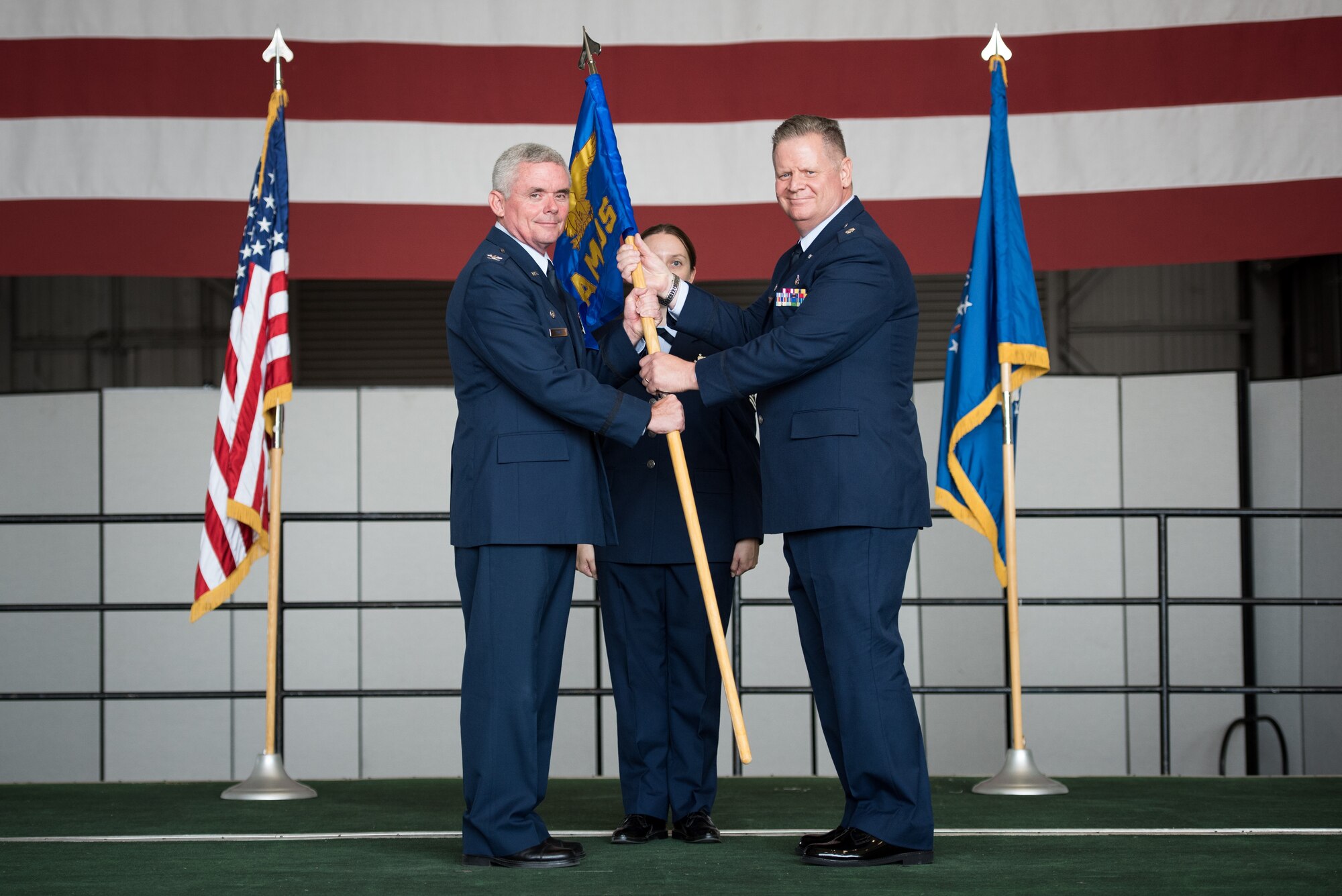 Lt. Col. Ralph Baker assumes command of the 940th Aerospace Medicine Squadron from Col. John Trnka, Jr., 940th Wing commander Aug. 2, 2015 at Dock 6, Beale Air Force Base, Calif. The squadron is responsible for the medical readiness of more than 1,100 reservists, including five geographically separated units. (U.S. Air Force photo by Staff Sgt. Brenda Davis/Released)