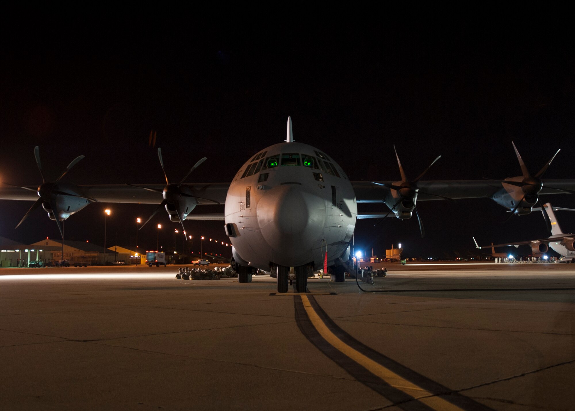 A C-130J sits on the flightline Aug. 6, 2015, at March Air Reserve Base, Calif. Twenty aircraft including C-130’s and C-17’s were used to drop more than 615 paratroopers and deliver Army assets such as 28 militarized all-terrain vehicles, 18 armored vehicles and two M142 high mobility artillery rocket systems. (U.S. Air Force photo by Senior Airman Scott Poe)