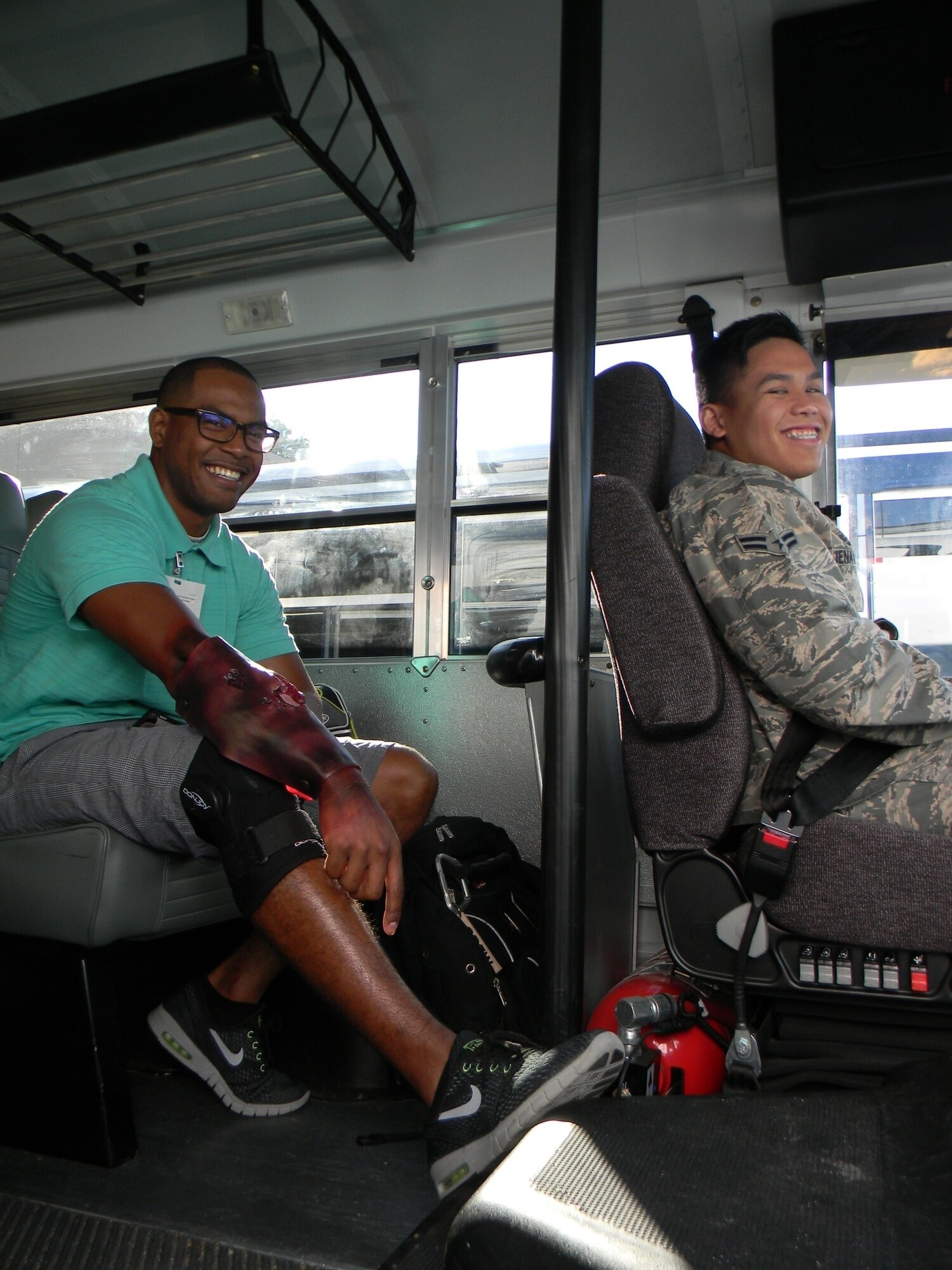 EXERCISE EXERCISE EXERCISE   No one is really hurt. The 79th Medical Wing Moulage team did a great job on the volunteers to make it look like they were injured. They are all smiles as they prepare to be bused to the location. More photos coming later today. EXERCISE EXERCISE EXERCISE