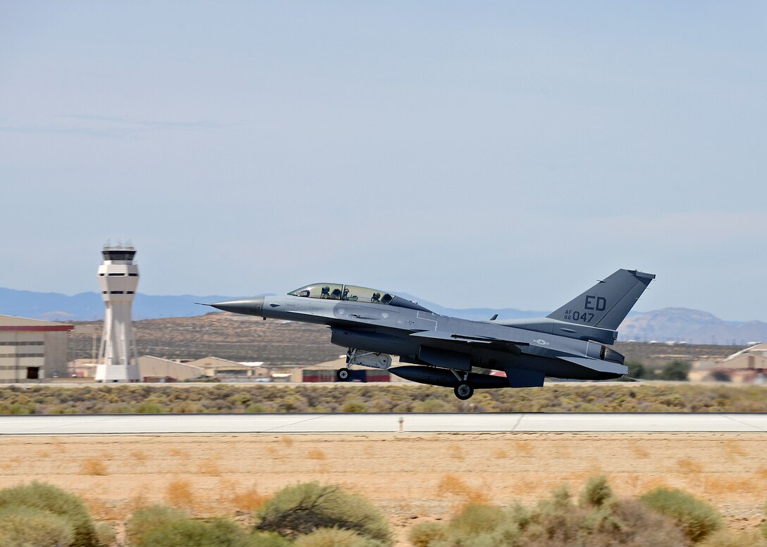 Capt. Joe Schenkel (front seat), 416th Flight Test Squadron F-16 test pilot, and Greg Welsh, a 33-year veteran maintainer and maintenance manager with the 412th Aircraft Maintenance Squadron, take off Edwards Runway 22L in an F-16 for Welsh’s familiarization flight that occurred Aug. 4, as part of the 412th Operations and Maintenance Immersion Program. This program is part of an initiative to give operators and maintainers the opportunity to create positive interaction so both gain insight into each other’s work dynamic. (U.S. Air Force photo by Jet Fabara)