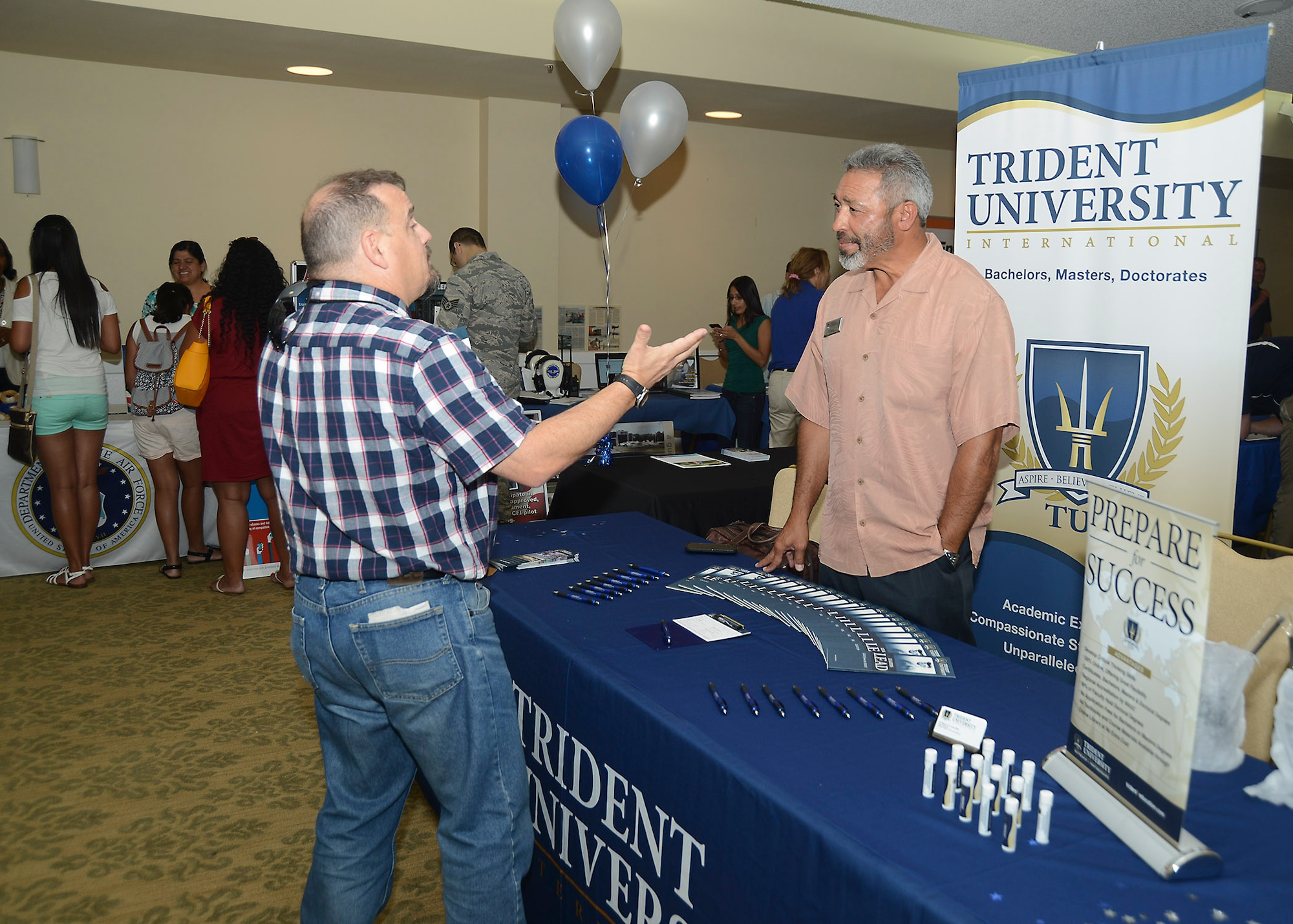 The Edwards Education Center hosted its annual Education Fair Aug. 12 at Club Muroc. More than a dozen colleges and universities came out to offer their services to Airmen, civilians and contractors alike who are interested in continuing their education. (U.S. Air Force photo by Kenji Thuloweit)