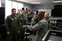 Chief Master Sgt. Gerardo Tapia, Air Education and Training Command command chief, speaks with members of the 47th Student Squadron on Laughlin Air Force Base, August 7, 2015. Through the Specialized Undergraduate Pilot Training program, Laughlin graduates more than 300 pilots annually and has the sixth busiest airfield in the Air Force. (U.S. Air Force photo by Airman 1st Class Brandon May)(Released)