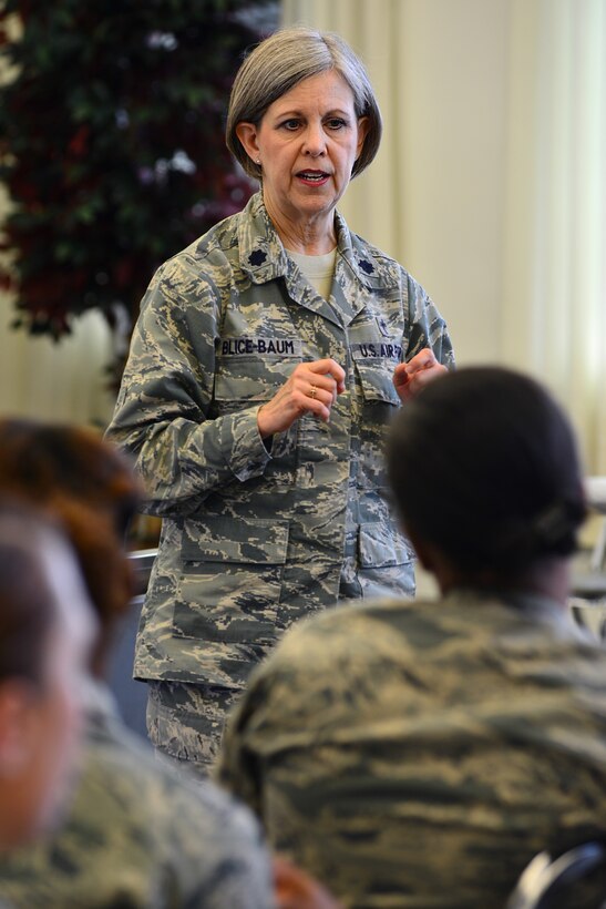 U.S. Air Force Chap. (Lt. Col.) Christine Blice-Baum, 633rd Air Base Wing deputy wing chaplain, speaks to Airmen during the Women Warriors Luncheon at Langley Air Force Base, Va., Aug. 12, 2015. Blice-Baum talked about the importance of bringing military women together in support of each other. (U.S. Air Force photo by Senior Airman Aubrey White/Released)