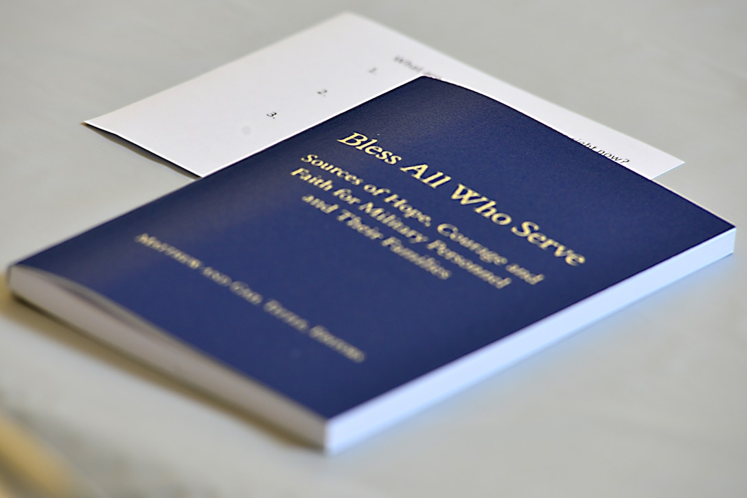 A prayer booklet rests on a table during the Women Warrior Luncheon hosted by 633rd Air Base Wing Chapel staff at Langley Air Force Base, Va., Aug. 12, 2015. During the luncheon, junior Airmen and seasoned leaders came together to bond, network and brainstorm ideas for future events for military women. (U.S. Air Force photo by Senior Airman Aubrey White/Released)
