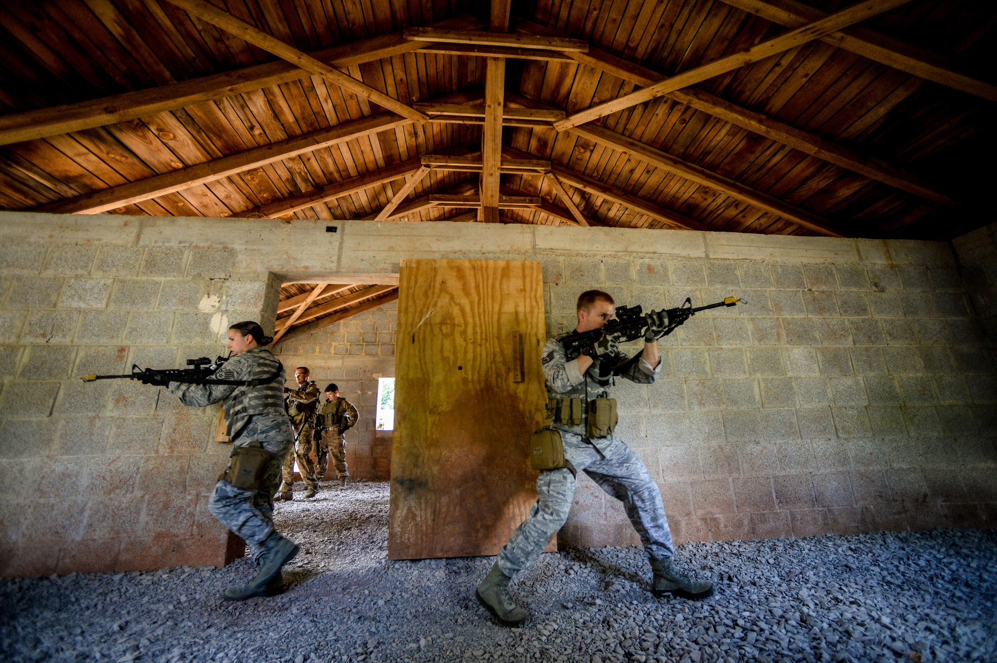 Ramstein Airmen conduct medical evacuation drills Aug. 5, 2015, on Baumholder, Germany.  More than 20 Airmen from the 435th Contingency Response Support Squadron, 435th Security Forces Squadron and the 86th Medical Group participated in the bi-annual Tactical Combat Casualty Care course Aug 3 through 6. (U.S. Air Force photo/Senior Airman Nicole Sikorski) 