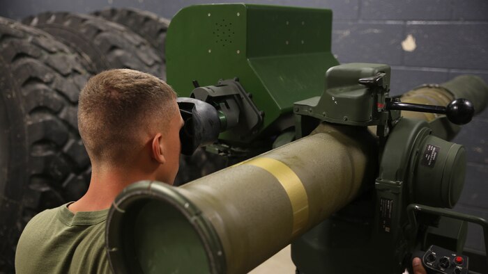 Lance Cpl. Gentry Osborne, an anti-tank missile man with Combined Anti-Armor Team Platoon, Weapons Company, 2nd Battalion, 2nd Marine Regiment, operates a simulated M41A4 Saber missile system during a simulated anti-armor exercise at Camp Lejeune, N.C., August 8, 2015. The simulated Saber challenged Marines with its inclusion of friendly and enemy targets, testing their judgement before firing. 