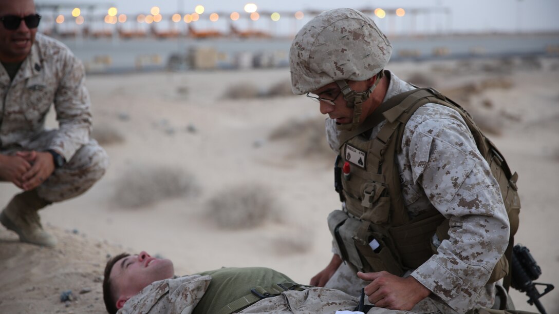 U.S. Marine Cpl. Jordan Trujillo, an air delivery specialist with the Logistics Combat Element, Special Purpose Marne Air-Ground Task Force-Crisis Response-Central Command from Fullerton, California,  treats his patient during the final test of the Combat Life Saver course in Southwest Asia, Aug. 12, 2015. During the final test the students work in pairs and each pair is given a different scenario where they must assess, treat and pass along a patient to a follow-on medical provider. The SPMAGTF corpsmen provide a three-day CLS course teaching combat triage and emergency trauma care to improve the survivability of the Crisis Response Company and coalition partners.