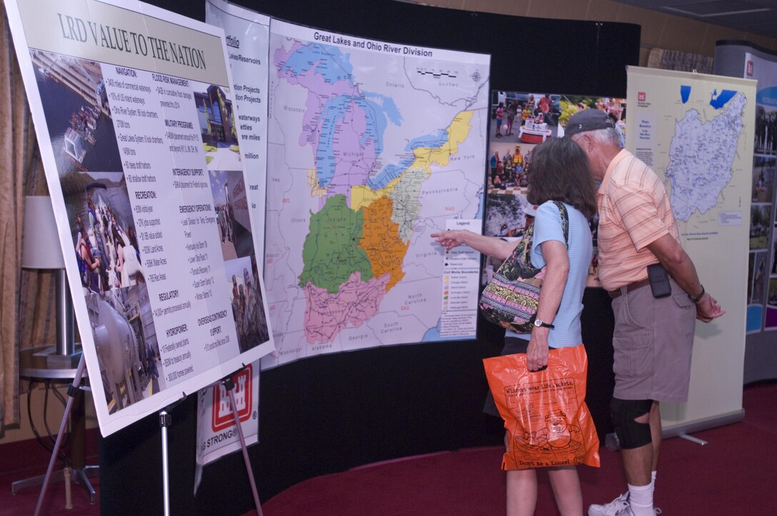 A couple looks at a display about the Great Lakes and Ohio River Division onboard the Motor Vessel Mississippi during a public tour of the vessel docked at Ross's Landing in Chattanooga, Tenn., Aug. 7, 2015. The M/V Mississippi spends more than 90 percent of its time as a working towboat, moving barges, equipment and supplies on the lower Mississippi River.  The M/V Mississippi, built in 1993 by Halter Marine, is the fifth Army Corps of Engineers towboat to bear the name.  It is the largest diesel towboat in the United States at 241-feet long, 58-feet wide and five stories high.  Three 2,100-horsepower diesel engines power the vessel.