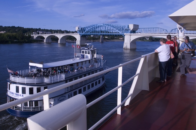The Southern Belle passes by the Motor Vessel Mississippi during a public tour of the vessel docked at Ross's Landing in Chattanooga, Tenn., Aug. 7, 2015. The M/V Mississippi spends more than 90 percent of its time as a working towboat, moving barges, equipment and supplies on the lower Mississippi River.  The M/V Mississippi, built in 1993 by Halter Marine, is the fifth Army Corps of Engineers towboat to bear the name.  It is the largest diesel towboat in the United States at 241-feet long, 58-feet wide and five stories high.  Three 2,100-horsepower diesel engines power the vessel.