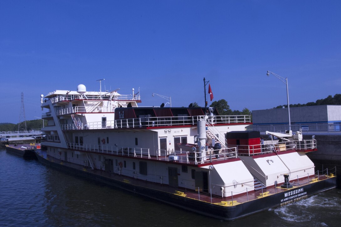 Motor Vessel Mississippi locks through Guntersville Lock in Grant, Ala., the morning of Aug. 9, 2015.  The lock, which is located at Tennessee River Mile 349, is maintained and operated by the U.S. Army Corps of Engineers Nashville District.  The vessel is transporting the Mississippi River Commission, which is conducting a low water inspection of the Tennessee River.
