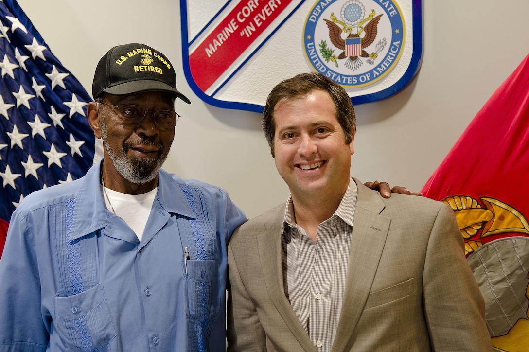 Cpl. Francis "Mike" East, one of the last Marine security guards to leave the American embassy in 1961, and David Arizmendi, a State Department official visit the Marine Corps Embassy Security Group aboard Marine Corps Base Quantico on Aug. 11 in preparation for their return to Havana to reopen the embassy.
