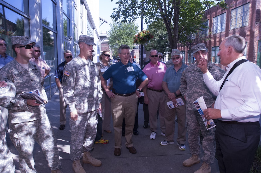 Roger Lindsey (Right), professional engineer and program manager for Metro Nashville Water Services, talks about how the city responded during the May 2010 flood during a walking tour of the city of Nashville, Tenn.  Several members of the Mississippi River Commission and local stakeholders took the tour Aug. 12, 2015. 