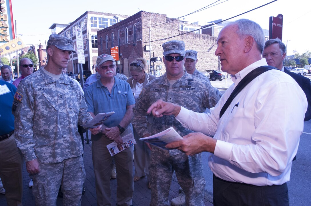 Roger Lindsey (Right), professional engineer and program manager for Metro Nashville Water Services, talks about how the city responded during the May 2010 flood during a walking tour of the city of Nashville, Tenn.  Several members of the Mississippi River Commission and local stakeholders took the tour Aug. 12, 2015. 