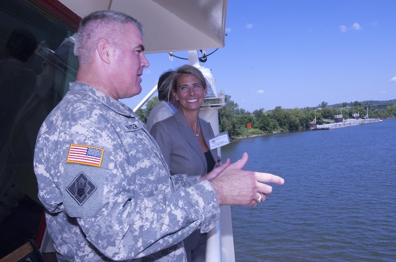 Brig. Gen. Richard G. Kaiser, U.S. Army Corps of Engineers Great Lakes and Ohio River Division, talks with Sonia Allman, Nashville Metro Water Services, onboard the Motor Vessel Mississippi in Nashville, Tenn., Aug. 12, 2015.  Kaiser was interacting with stakeholders during a low water inspection trip on the Cumberland River in the Nashville District area of operations.