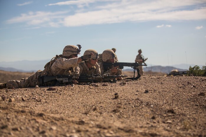 U.S. Marines with Company B, 1st Battalion, 3rd Marine Regiment, conduct a simulated casualty evacuation as a part of a Battalion Assault Course during an Integrated Training Exercise (ITX) at Marine Corps Air Ground Combat Center Twentynine Palms, Calif., Aug. 12, 2015. ITX is conducted to enhance the integration and warfighting capability from all elements of the Marine Air Ground Task Force. (U.S. Marine Corps photo by Lance Cpl. Clarence A. Leake/Released)