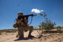 U.S. Marine Corps Pfc. John Constant with Company B, 1st Battalion, 3rd Marine Regiment, fires a M27 infantry assault rifle as part of a Battalion Assault Course during an Integrated Training Exercise (ITX) at Marine Corps Air Ground Combat Center Twentynine Palms, Calif., Aug. 11, 2015. ITX is conducted to enhance the integration and warfighting capability from all elements of the Marine Air Ground Task Force. (U.S. Marine Corps photo by Lance Cpl. Clarence A. Leake/Released)
