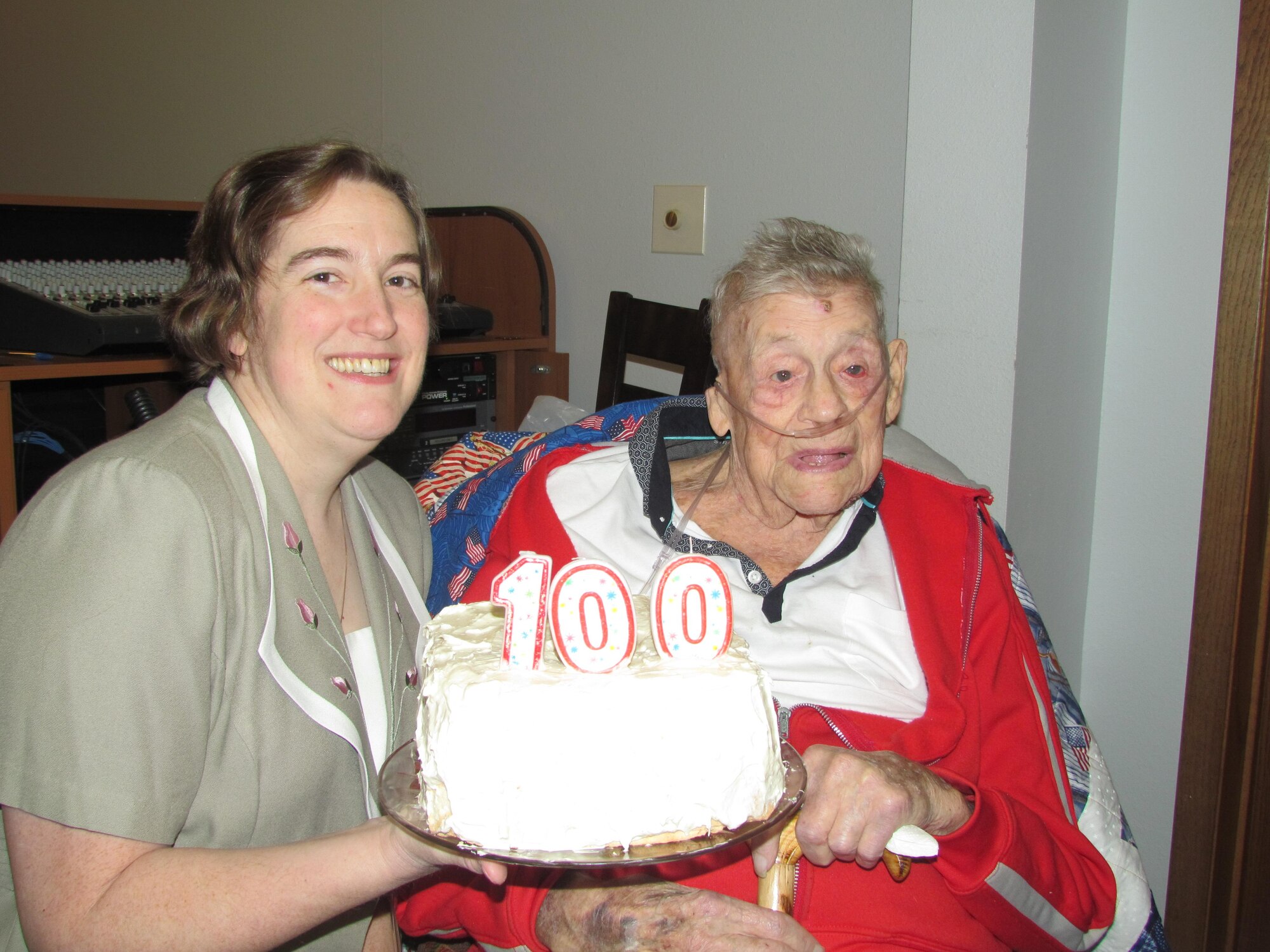 Lt. Col. Esther Weightman celebrates Verne Hendricks' 100th birthday with him in January. Hendricks, a patient of Weightman’s, was an infantryman in the U.S. Army. He received a Bronze Star and two Purple Hearts while serving in the Army. (Courtesy photo)