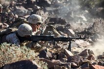 Marines with Company A, 1st Battalion, 7th Marine Regiment, provide suppressing fire during a Military Operation on Urban Terrain exercise aboard Marine Corps Air Ground Combat Center Twentynine Palms, California, Aug. 11, 2015. The MOUT exercise was part of an Integrated Training Exercise that allowed the Marines with Animal Company to showcase their different capabilities in preparation for future deployments.