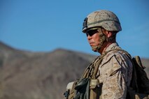 Brigadier Gen. Daniel Yoo, the deputy commanding general of 1st Marine Division, observes at a military operation on urban terrain exercise held by Company A, 1st Battalion, 7th Marine Regiment, as part of Integrated Training Exercise aboard Marine Corps Air Ground Combat Center Twentynine Palms, California, Aug. 11, 2015. Animal Company showcased the Marine Corps’ ability to execute tactically and proficiently in any area of operation.