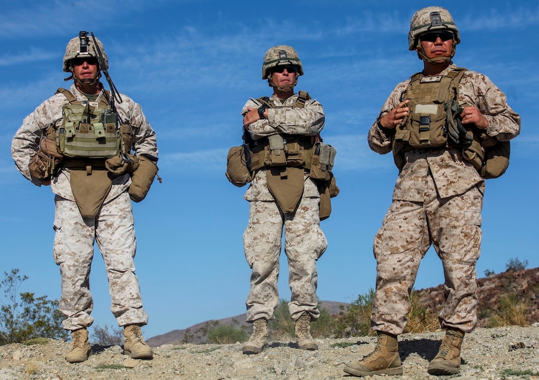 Brigadier Gen. Daniel Yoo, the deputy commanding general of 1st Marine Division, observes a military operation on urban terrain exercise held by Company A, 1st Battalion, 7th Marine Regiment, as part of Integrated Training Exercise aboard Marine Corps Air Ground Combat Center Twentynine Palms, California, Aug. 11, 2015. The MOUT exercise was conducted as part of Integrated Training Exercise and allowed the Marines to practice many different capabilities in preparation for future deployments.