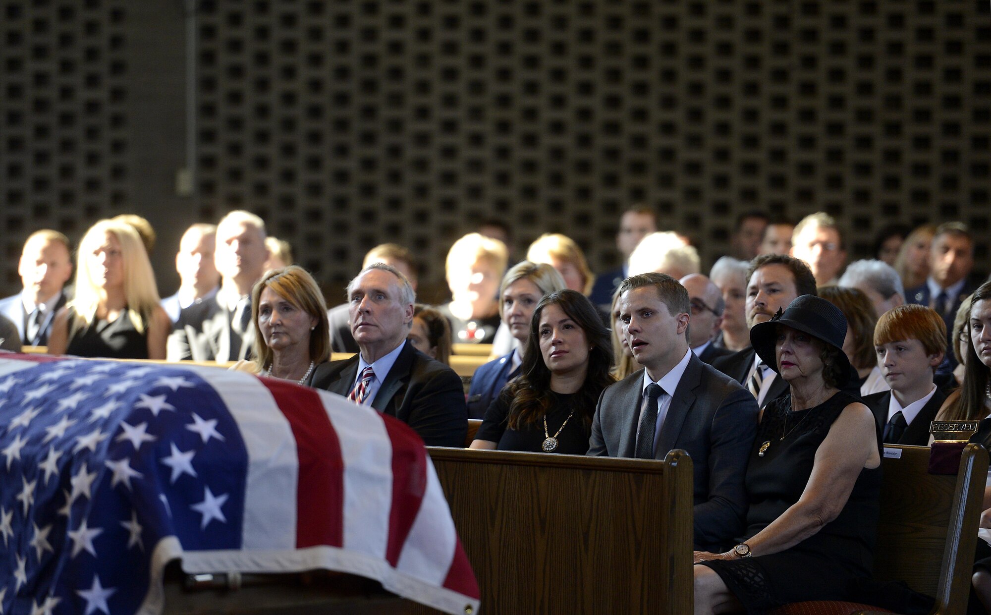 Family, friends and fellow Airmen attend the memorial service in honor ninth Chief Master Sgt. of the Air Force James C. Binnicker, before he is laid to rest in Arlington National Cemetery, Va., Aug. 14, 2015. Binnicker passed away March 21 in Calhoun, Ga. (U.S. Air Force photo/Scott M. Ash)