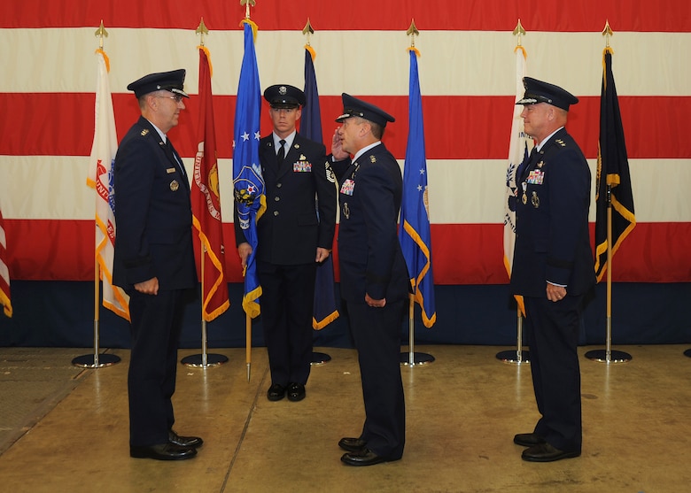 U.S. Air Force Lt. Gen. David J. Buck salutes U.S. Air Force Gen. John E. Hyten, commander, Air Force Space Command, as he prepares to assume command of 14th Air Force (Air Forces Strategic), during a change of command ceremony Aug. 14, 2015, at Vandenberg Air Force Base, Calif. As the Air Force's sole numbered Air Force for space, 14th AF is responsible for the organization, training, equipping, command and control and employment of Air Force space forces to support operational plans and missions for U.S. combatant commanders and air component commanders. (U.S. Air Force photo/Michael Peterson)