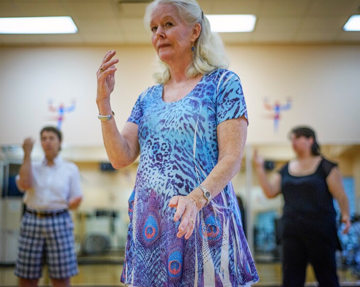 Mary Cameris leads a T'ai Chi class at Vance Air Force Base, Oklahoma, Aug. 10. (U.S. Air Force photo / David Poe)