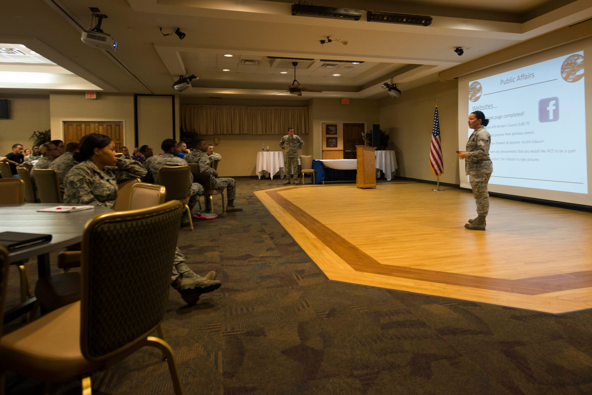 U.S. Air Force Senior Airman Sydney Vidaurri, 23d Medical Operations Squadron physical therapy technician, speaks during an Airmen Committed to Excellence general membership meeting Aug. 13, 2015, at Moody Air Force Base, Ga. Vidaurri, who is the ACE Public Affairs representative, introduced the organization’s newly designed social media page during the event.  (U.S. Air Force photo by Airman 1st Class Dillian Bamman/Released)