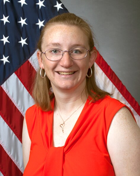 Niomi Briggs, 319th Missile Squadron key spouse, poses for in the 90th Missile Wing Public Affairs studio April 4, 2015. Briggs and Ashleigh Street, the other 319th key spouse, help 319th spouses deal with daily stresses when their military spouse is out in the field. (U.S. Air Force photo)