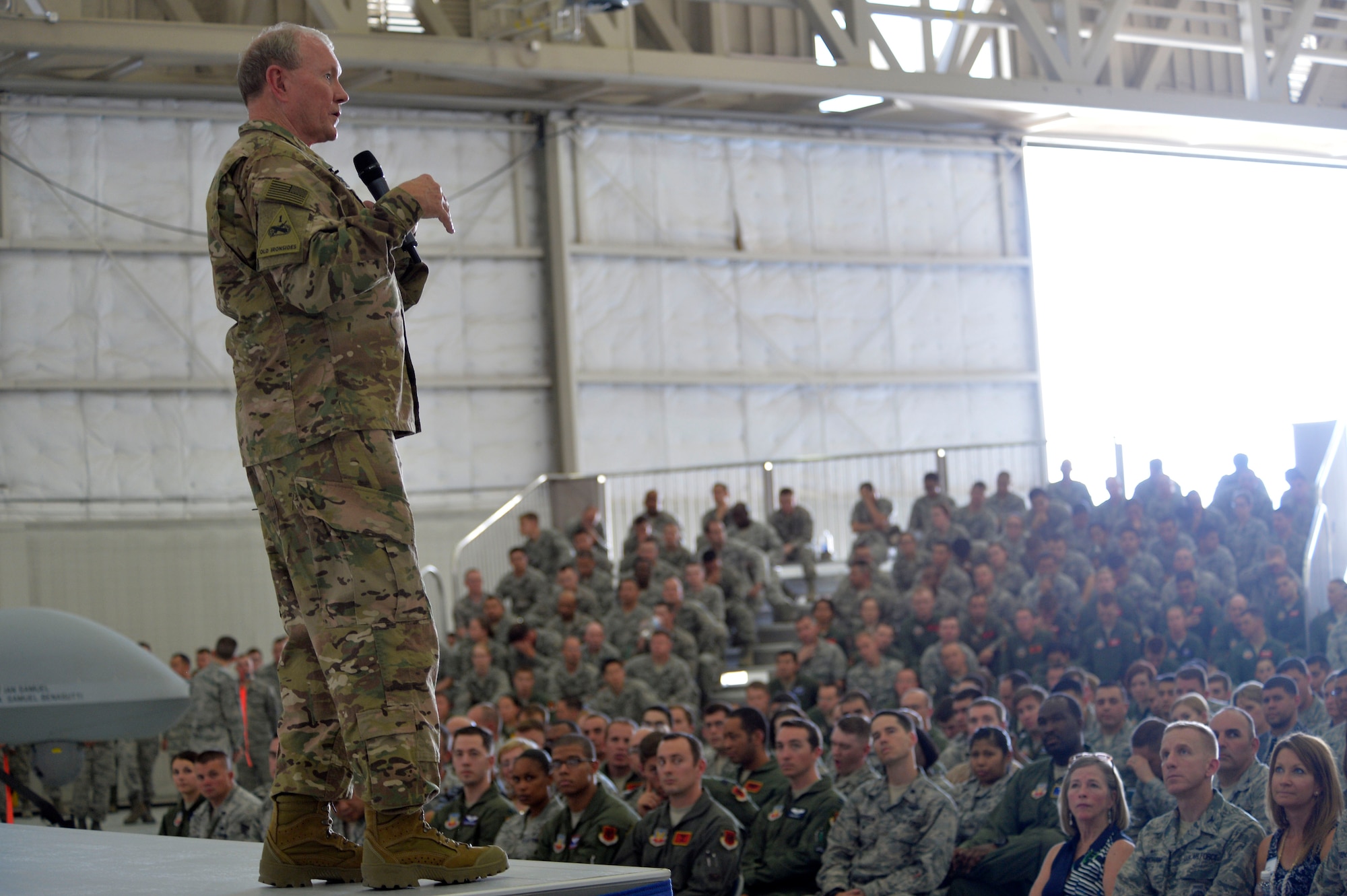 Army Gen. Martin E. Dempsey, Chairman of the Joint Chiefs of Staff speaks during an all-call on Aug. 12, 2015, at Creech Air Force Base, Nevada. This visit was the last domestic visit before Dempsey tours the overseas bases. (U.S. Air Force photo by Airman 1st Class Christian Clausen/Released)