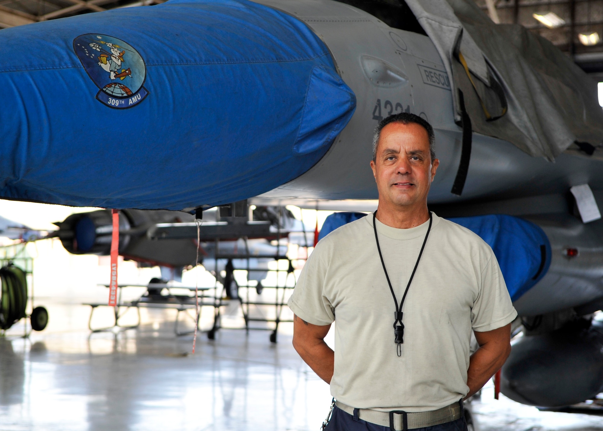 Master Sgt. Steven Joubert, 944th Detachment 1, is the first Air Reserve aircrew chief to hold a position within the 309th Aircraft Maintenance Unit since the 944th base realignment and closure in 2007 poses for a photo August 10, 2015 at Luke Air Force Base. (U.S. Air Force photo by Senior Airman Marcy Copeland)