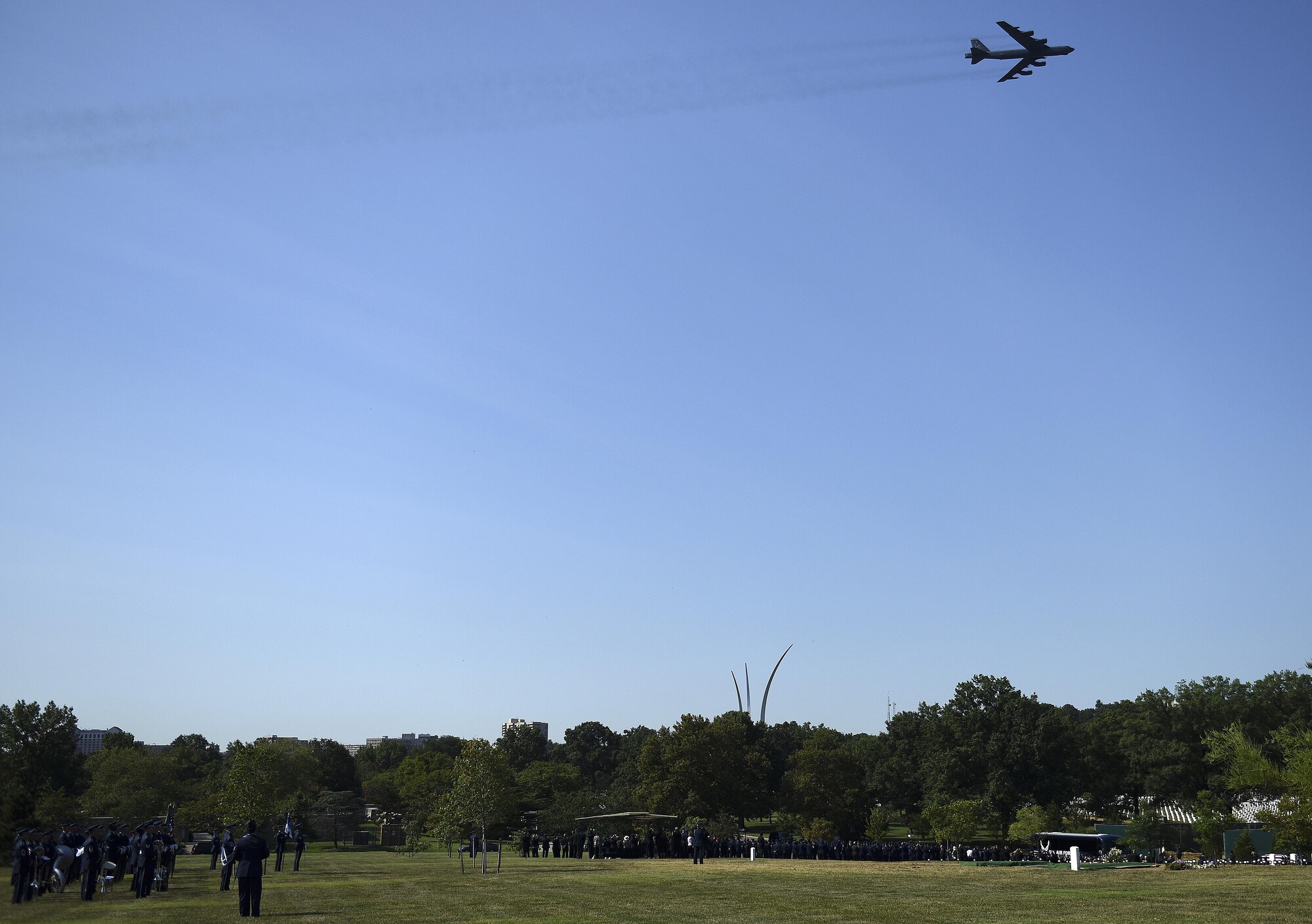 A B-52H Stratofortress from Minot Air Force Base, N.D., flies in honor of ninth Chief Master Sgt. of the Air Force James Binnicker before he is laid to rest in Arlington National Cemetery, Aug. 14, 2015. Binnicker passed away March 21, in Calhoun, Ga. (U.S. Air Force photo/Tech. Sgt. Dan DeCook)