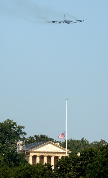 A B-52H Stratofortress from Minot Air Force Base, N.D., flies in honor of ninth Chief Master Sgt. of the Air Force James Binnicker before he is laid to rest in Arlington National Cemetery, Aug. 14, 2015. Binnicker passed away March 21, in Calhoun, Ga. (U.S. Air Force photo/Scott M. Ash)