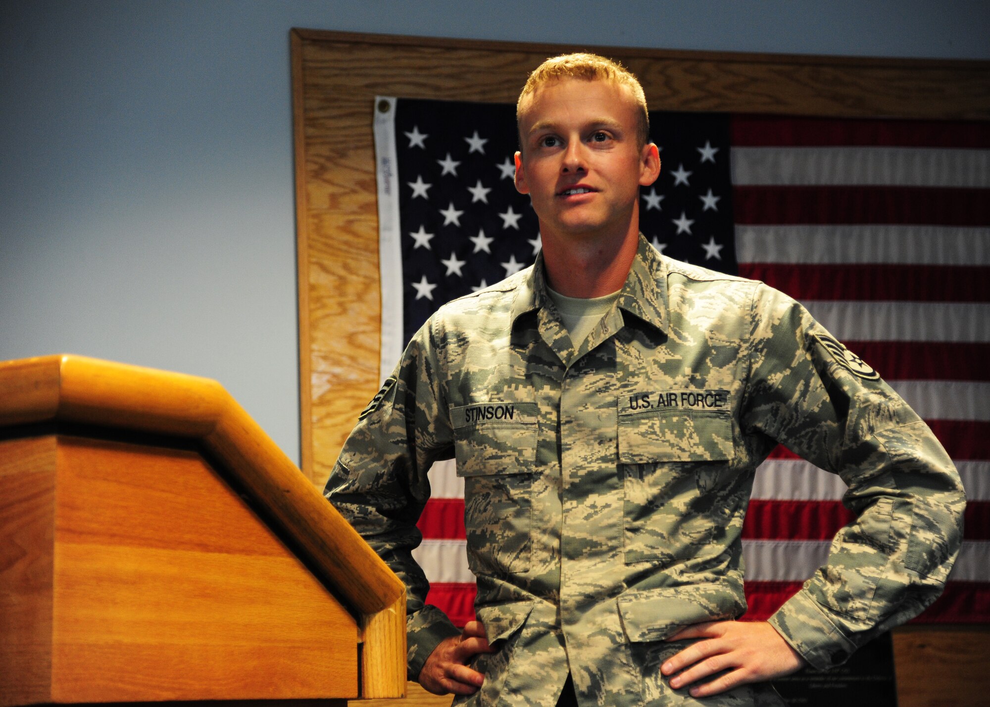 Staff Sgt. Bradley Stinson, 319th Logistics Readiness Squadron deployment training NCO-in-charge, listens to coaching during emcee auditions for the 2015 Air Force Ball August 14, 2015, on Grand Forks Air Force Base, North Dakota. Stinson was one of several Airmen to audition to be an emcee for the ball. (U.S. Air Force photo by Airman 1st Class Ryan Sparks/Released) 