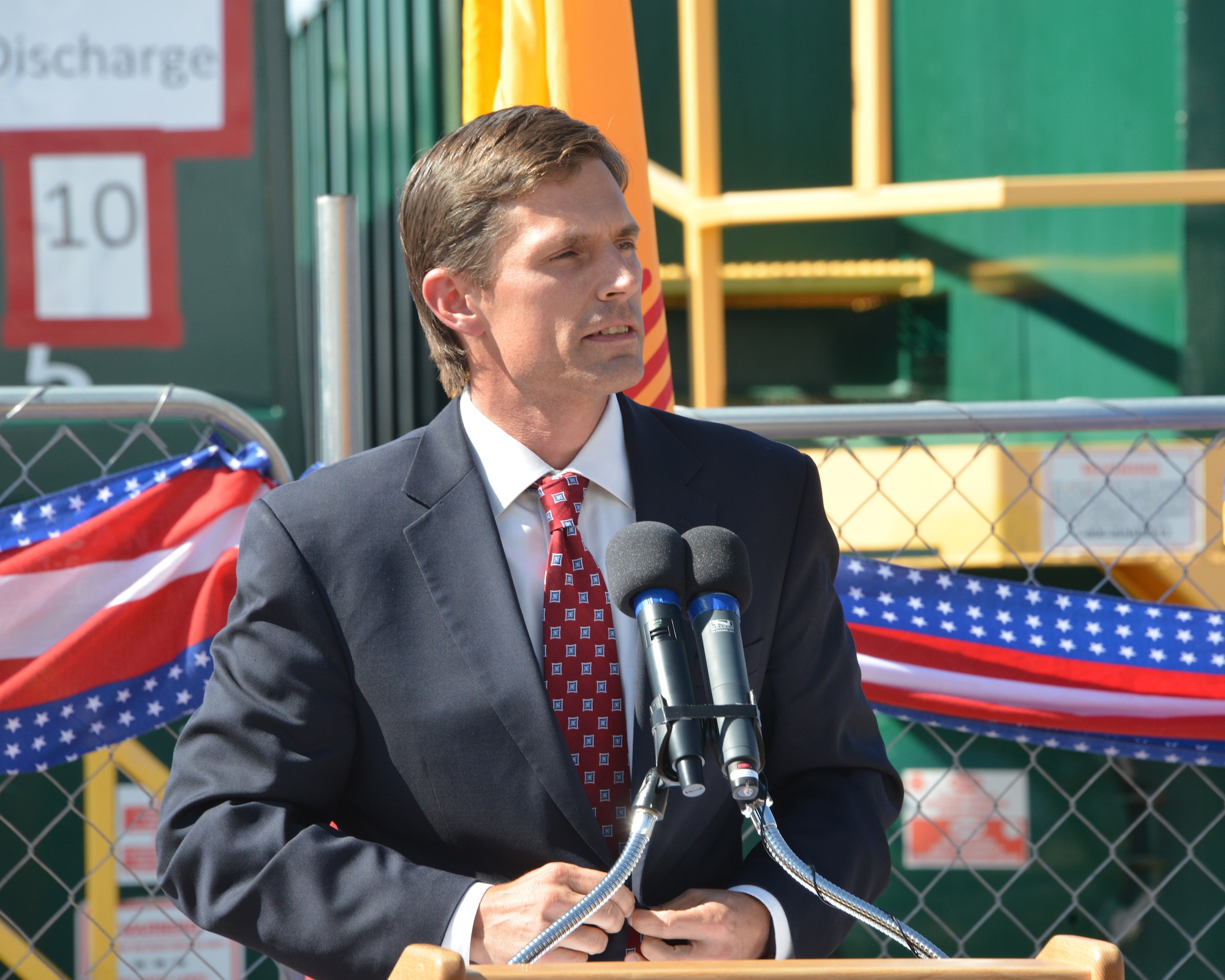 U.S. Senator Martin Heinrich speaks to guests and media at Kirtland's bulk fuels facility milestone event Aug. 13. The event marked the installation of a pump-and-treat water system and the successful extraction and treatment of fuel contamination associated with a fuel leak discovered in 1999. (Photo by Dennis Carlson)