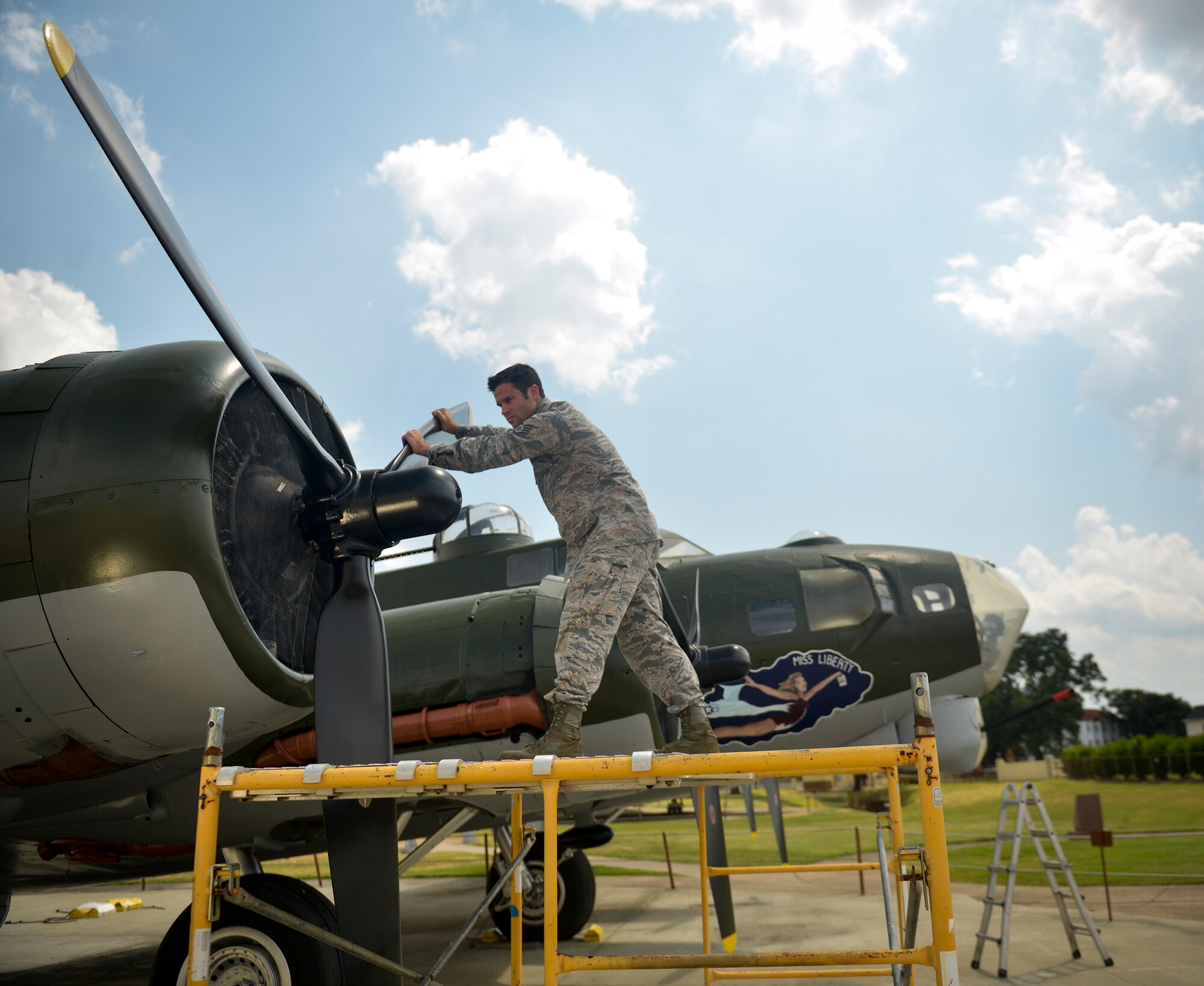 Tech Sgt. Garrett Hulett, Barksdale Global Power Musuem Non-Commissioned Officer in Charge, performs maintenance on the museum’s B-17 Flying Fortress. Hulett maintains the air park’s 20 static displays, including 17 aircraft that span from a World War II B-24 Liberator to an SR-71 Blackbird. (U.S. Air Force photo/Airman 1st Class Mozer O. Da Cunha)