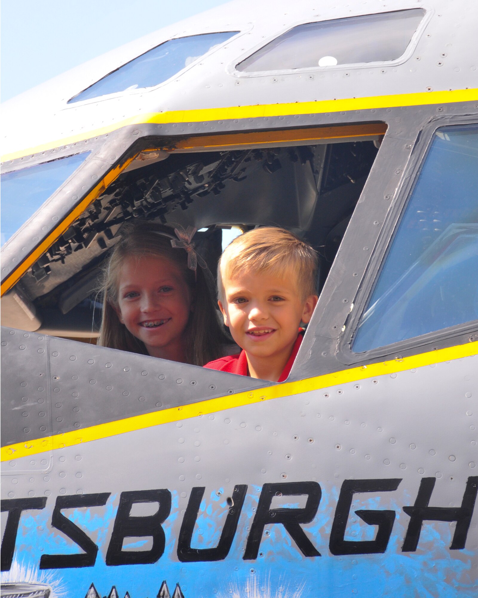 Grace Perez (left) and Henry Perez sit in the cockpit of a KC-135 after the 171st Air Refueling Wing’s Assumption of Command ceremony Coraopolis, Pa. Aug. 2, 2015. The KC-135 was available for touring after the ceremony. (U.S. Air National Guard photo by Staff Sgt. Michael P. Fariss/released)