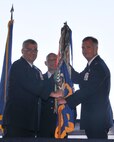 Col. Gregg A. Perez (right) formally assumes command while Brig. Gen. Anthony J. Carrelli passes the 171st Air Refueling Wing guidon during an Assumption of Command ceremony Coraopolis, Pa. Aug. 2, 2015. Perez is the 21st Commander at the Wing. (U.S. Air National Guard photo by Staff Sgt. Michael P. Fariss/released)