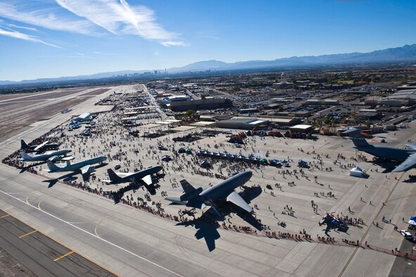 Attendees of the 2014 Nellis Open House enjoy the event’s festivities at Nellis Air Force Base, Nev., Nov. 12, 2014. Today, Nellis provides operation support for six wings, Nevada Test and Training Range, United States Air Force Warfare Center, 52 tenant units and approximately 12,000 military and civilian members.(U.S. Air Force photo by Senior Airman Christopher Tam)
