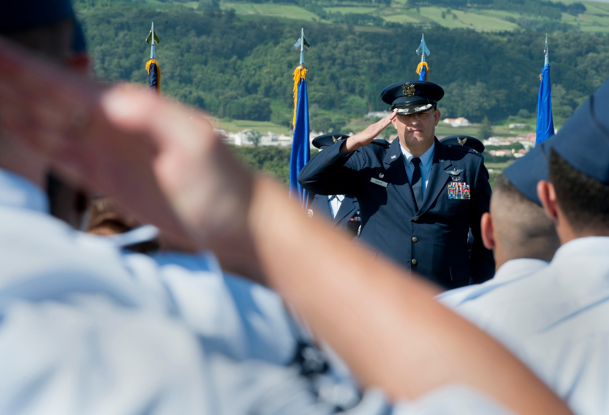Col. Richard Sheffe, commander of the 65th Air Base Group, is saluted by members of the 65th Air Base Group, during a Redesignation Ceremony on Lajes Field, Azores, Portugal, August 14, 2015. With this Redesignation Ceremony the 65th Air Base Group is now aligned under the 86th Airlift Wing and remains positioned to provide agile combat support and services to aircraft and aircrews. (U.S. Air Force photo by Master Sgt. Bradley C. Church)