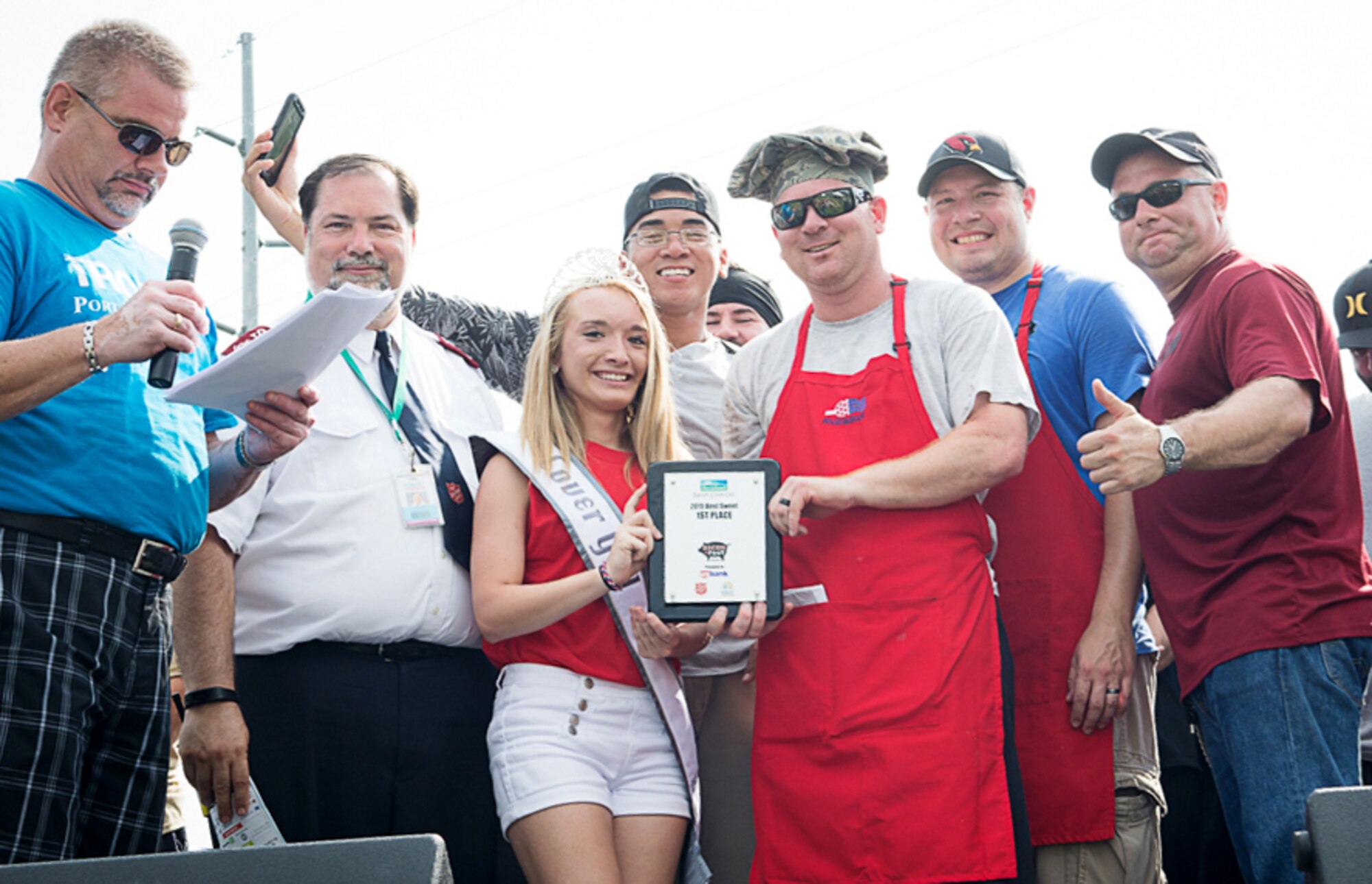 OMAHA, Nebraska -- The “Dad Bods n Tasty Hogs” team, comprised of five Airmen from Offutt Air Force Base, Nebraska, received their first place plaque in the 3rd Annual Bacon Fest’s Best Savory Category at the Ray & Joan Kroc Corps Community Center on Aug. 9. The overall event featured ten teams presenting 16 dishes from around the Omaha area with the proceeds going to the Ray & Joan Kroc Corps Community Center.  (Courtesy photo)