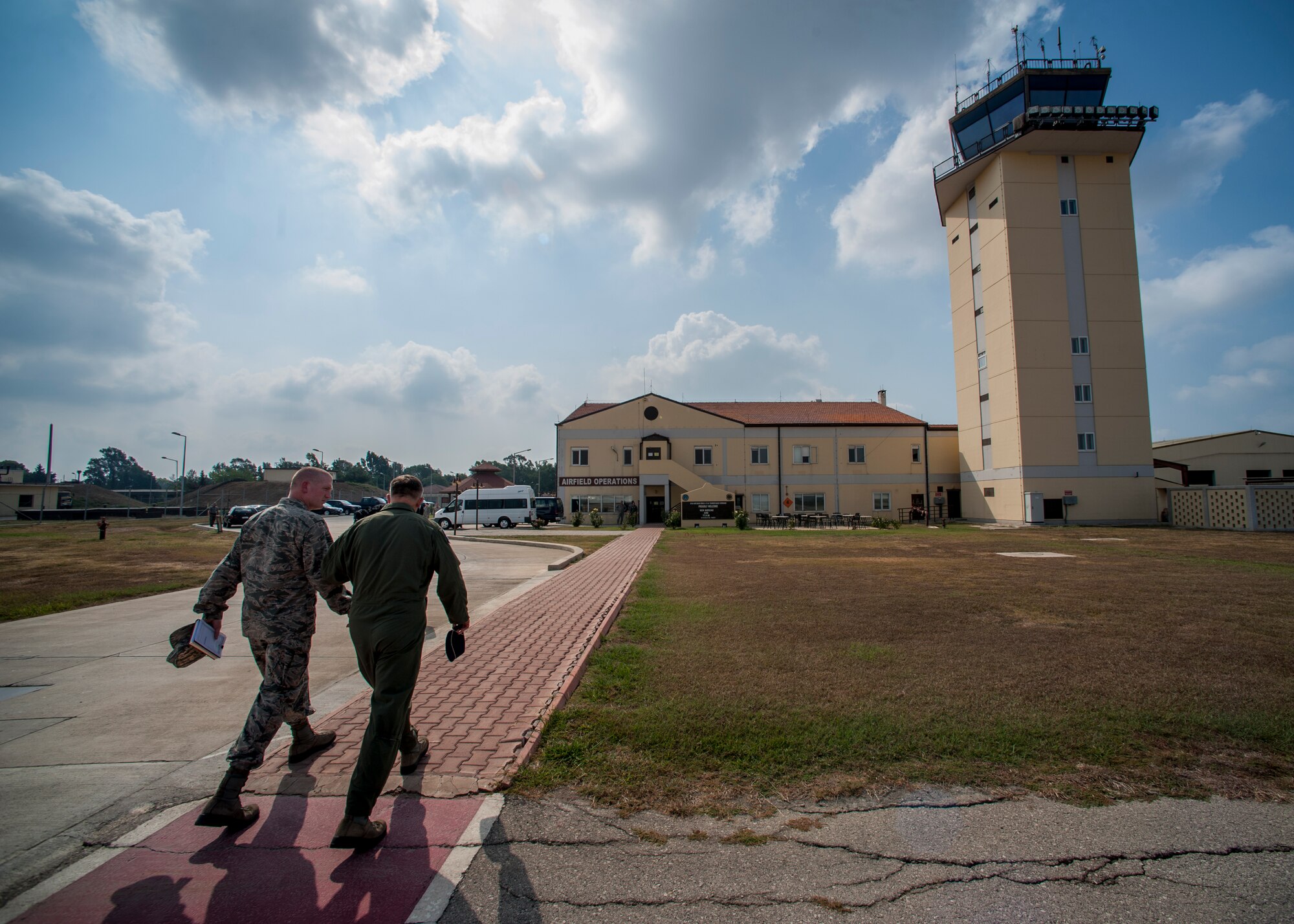 Gen. Frank Gorenc, U.S. Air Forces in Europe and Air Forces Africa commander, walks with Col. John Walker, 39th Air Base Wing commander, during a visit Aug. 14, 2015, at Incirlik Air Base, Turkey. Gorenc met with Incirlik’s leadership, toured the base and attended a briefing about the base and its mission. (U.S. Air Force photo by Airman 1st Class Cory W. Bush/Released)