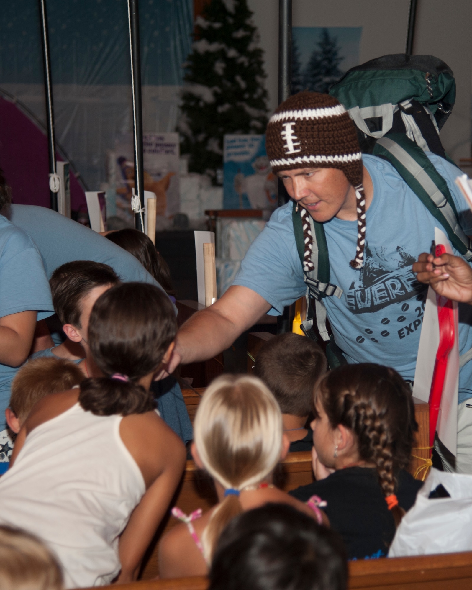 Chaplain (Capt.) Quentin Genke, 436th Airlift Wing chaplain, leads vacation bible school August 6, 2015, at Chapel One on Dover Air Force Base, Del. One of the main services chaplains provide is spiritual care as well as supports the opportunity for Airmen and their families to exercise their constitutional right to the free exercise of religion. (U.S. Air Force photo/Senior Airman Jared Duhon)