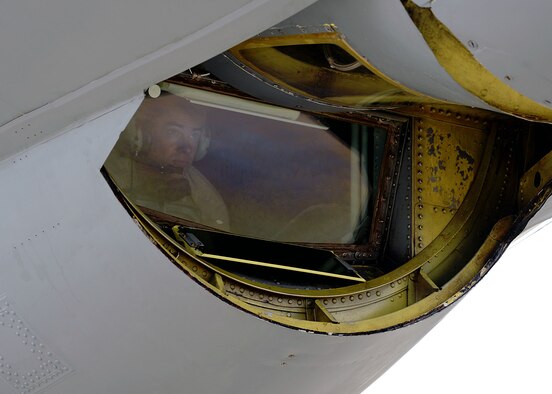 U.S. Air Force Staff Sgt. James Harris, 100th Maintenance Squadron hydraulics technician from Abilene, Texas, monitors and controls the travel of a KC-135 Stratotanker boom, Aug. 11, 2015, on RAF Mildenhall, England. Harris was lowering the boom in preparation for an inspection. (U.S. Air Force photo by Senior Airman Christine Halan/Released) 