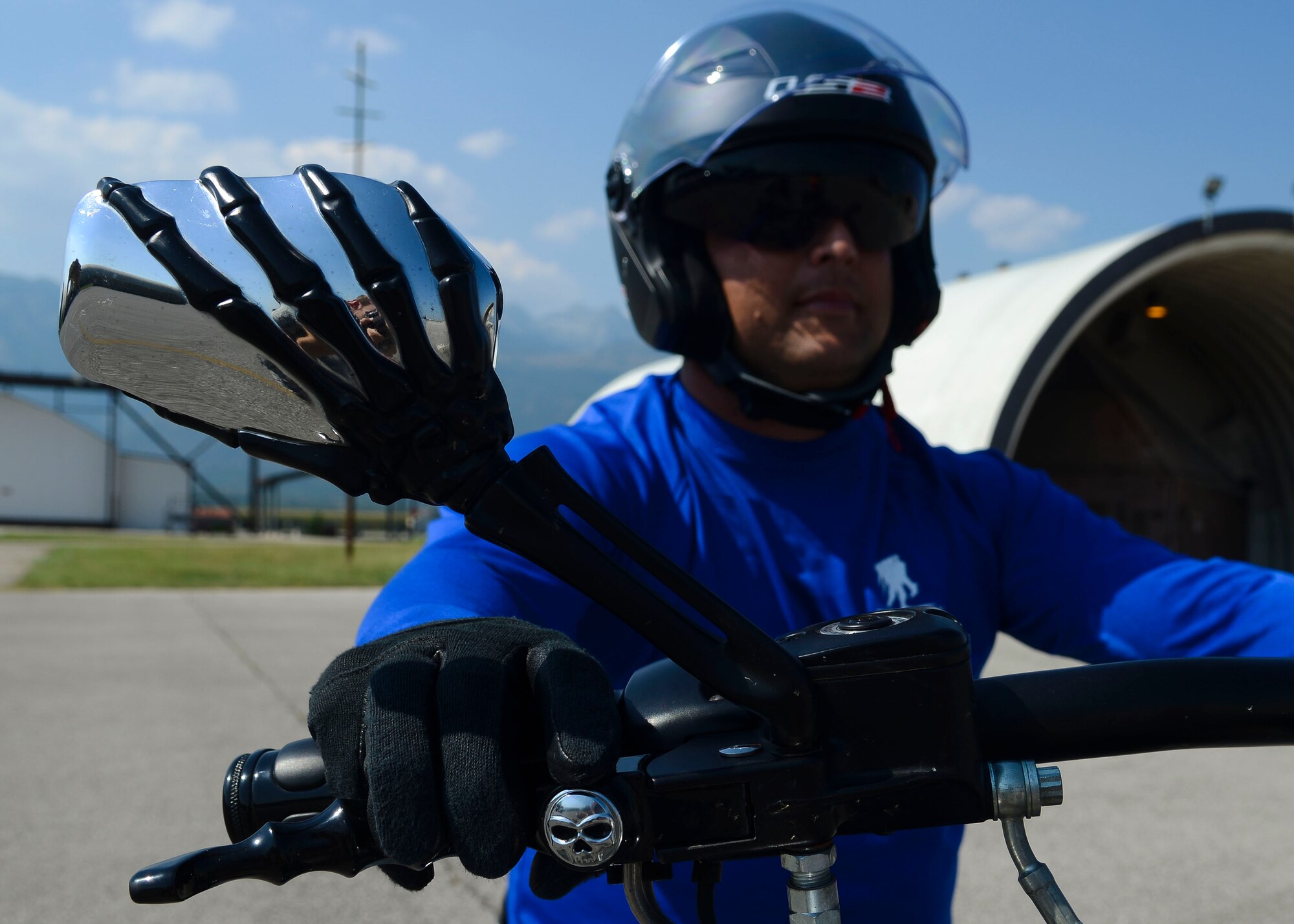 U.S. Air Force Senior Master Sgt. Michael Kilgore, 31st Maintenance squadron precision measurement equipment laboratory flight chief, prepares for a riding skills exercise during a Riding Coach Preparation Workshop, Aug. 13, 2015, at Aviano Air Base, Italy. Participants were tested on their knowledge of road skills, signs and maneuvers before graduating. (U.S. Air Force photo by Senior Airman Austin Harvill/Released)