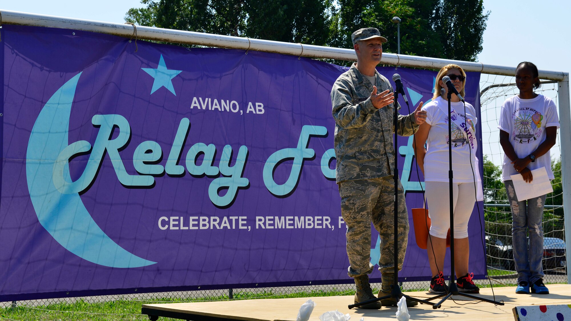 U.S. Air Force Col. Bryan Wolford, 31st Fighter Wing vice commander, delivers a speech at a Relay for Life event, Aug. 7, 2015, at Aviano Air Base, Italy. Wolford thanked the attendees for participating in the event and talked about the importance of resiliency and helping one another. (U.S. Air Force photo by Airman 1st Class Cary Smith/Released)